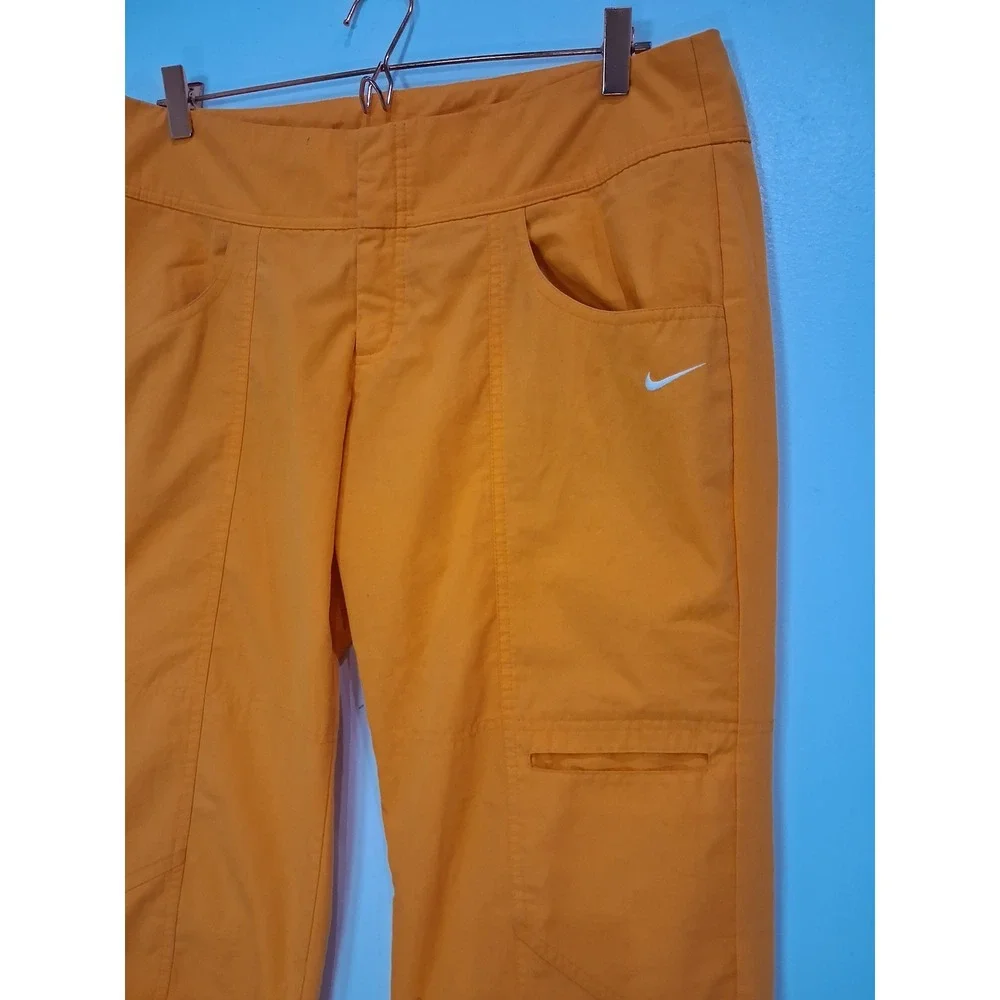 Nike Womens Orange Cargo Capri Pants Size L Cropped Hiking Utility Toggles
